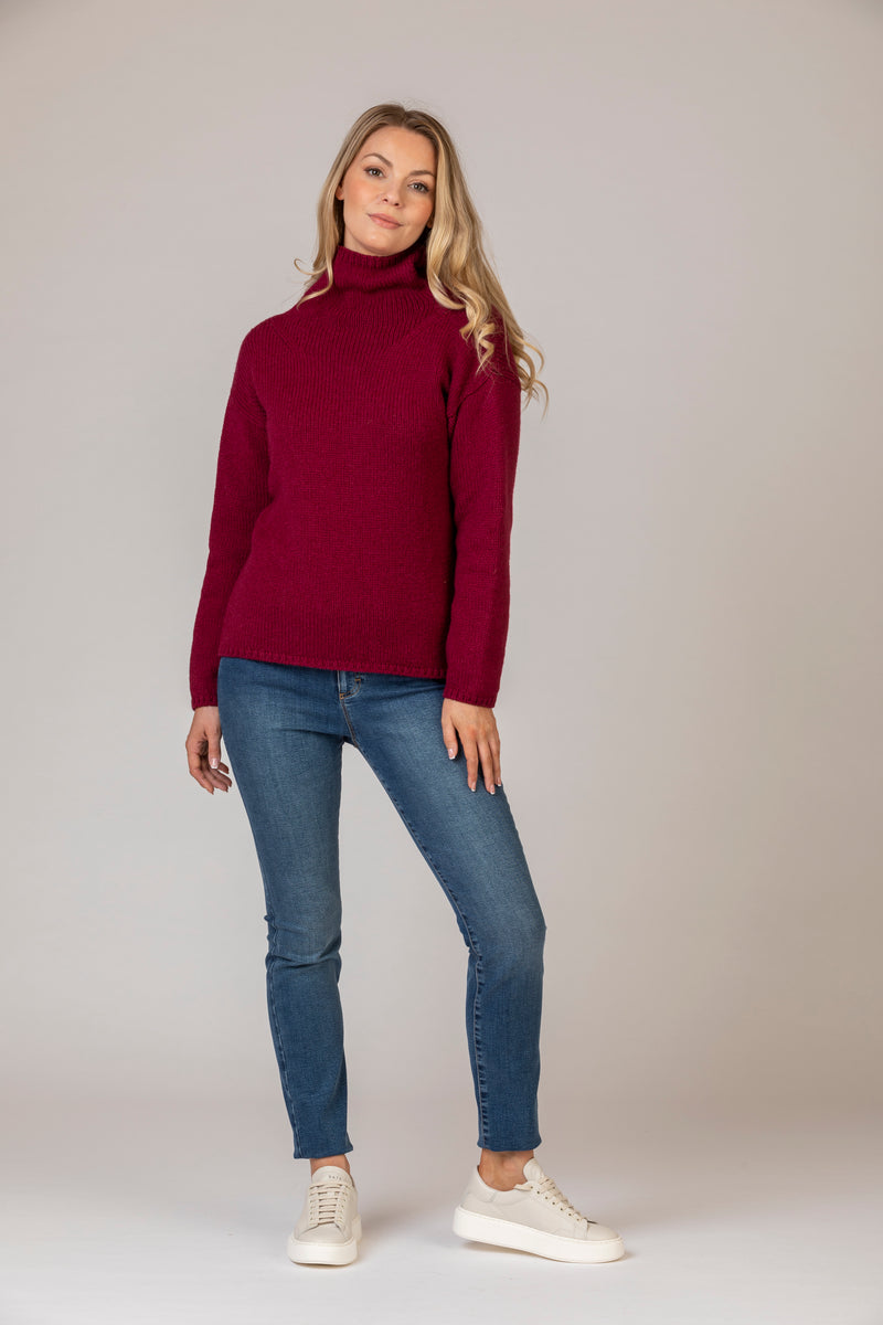 Berry Merino Sweater | Fisherman Out of Ireland at Sarah Thomson | Styled on model with jeans 