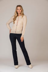 Soft Sand Cashmere Cardigan with Multi-Coloured Velvet Buttons | Estheme Cashmere at Sarah Thomson | Styled with Mary Brax Jeans