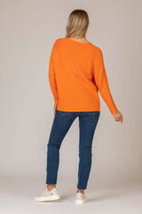Relaxed Cashmere V-Neck Jumper in Orange | Esthēme Cachemire at Sarah Thomson | Back of jumper