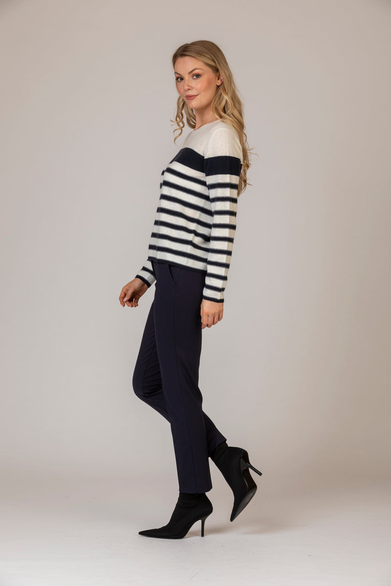 Navy and Cream Stripe Cashmere Jumper | Esthēme Cachemire at Sarah Thomson | Side profile in Maron Trousers