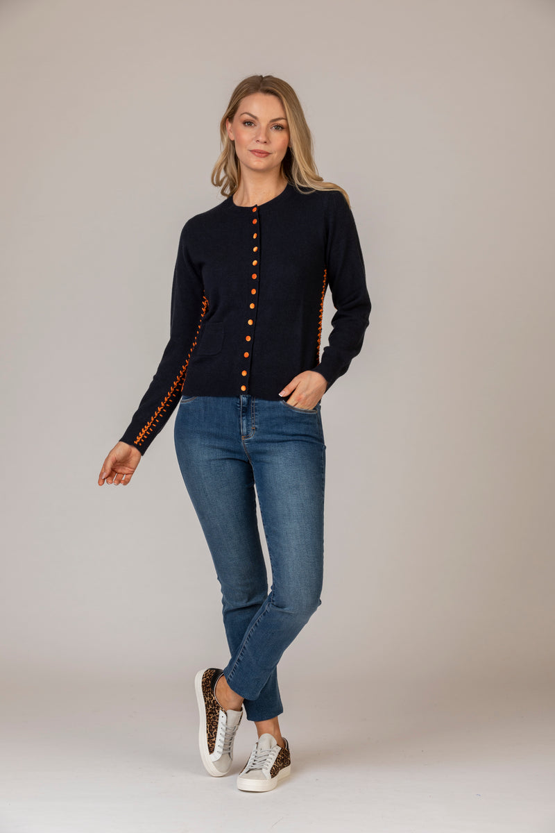 Cashmere Cardigan with Contrast Buttons and Stitching in Navy and Orange | Esthēme Cachemire at Sarah Thomson | Styled with Brax jeans
