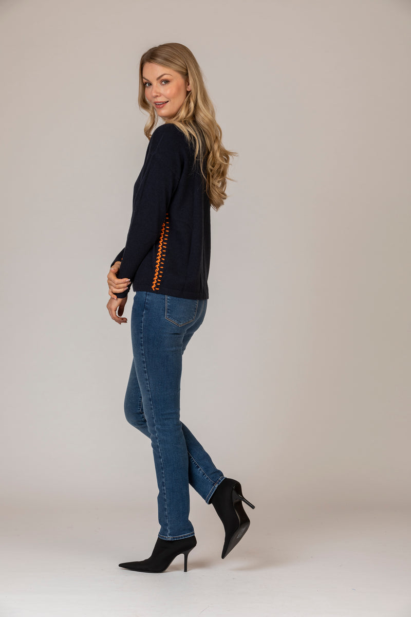 Cashmere V-Neck Jumper with Contrast Stitching in Navy and Orange | Estheme Cashmere at Sarah Thomson | Side profile