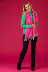 Bright Green Roll Neck Cashmere Jumper | Esthēme Cachemire at Sarah Thomson | Pink scarf and pink background