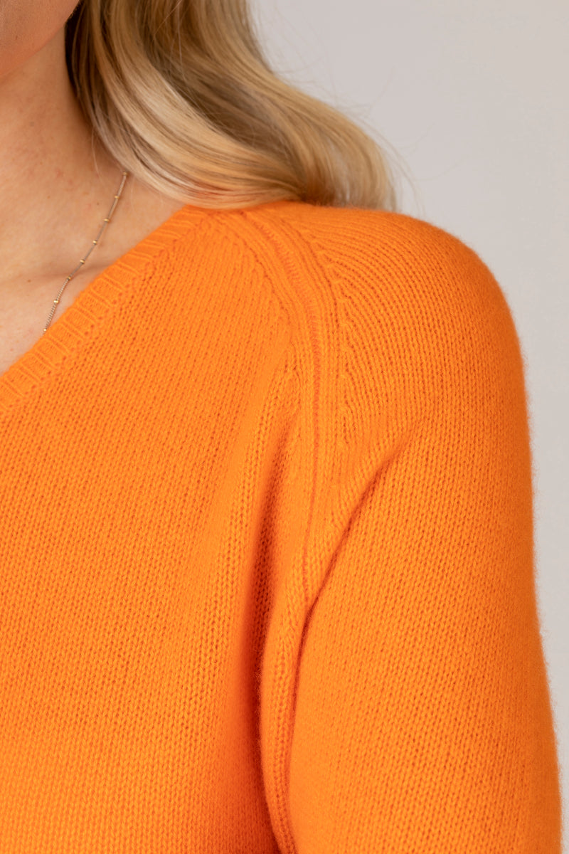 Relaxed Cashmere V-Neck Jumper in Orange | Esthēme Cachemire at Sarah Thomson | Orange Knit Details