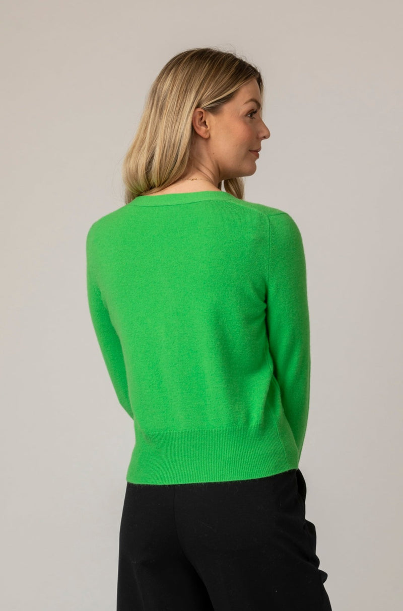 Apple Green Bright Cashmere Cardigan | Esthēme Cachemire | Sarah Thomson Melrose | Back of cardigan on model